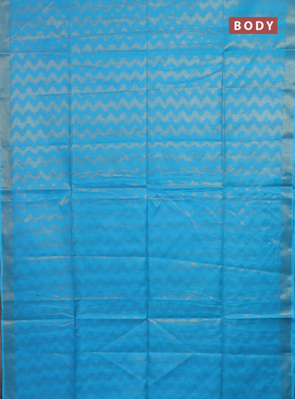 Semi munga jacquard saree light blue with allover zari weaves and zari woven border