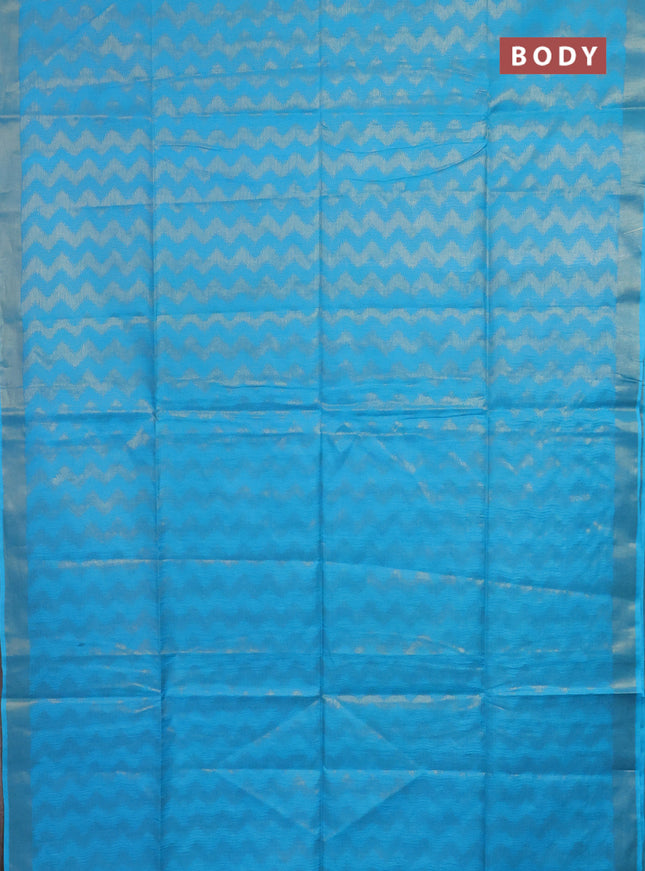 Semi munga jacquard saree light blue with allover zari weaves and zari woven border