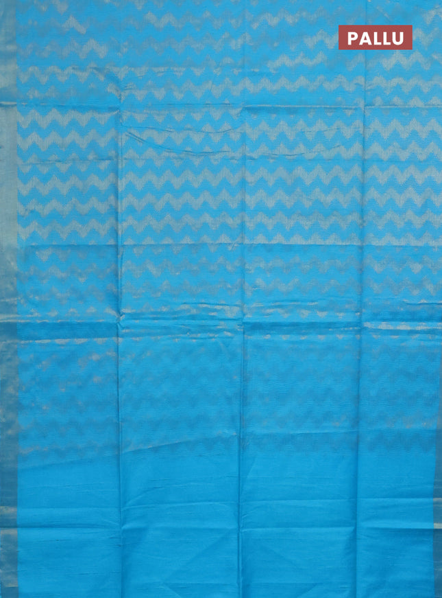 Semi munga jacquard saree light blue with allover zari weaves and zari woven border
