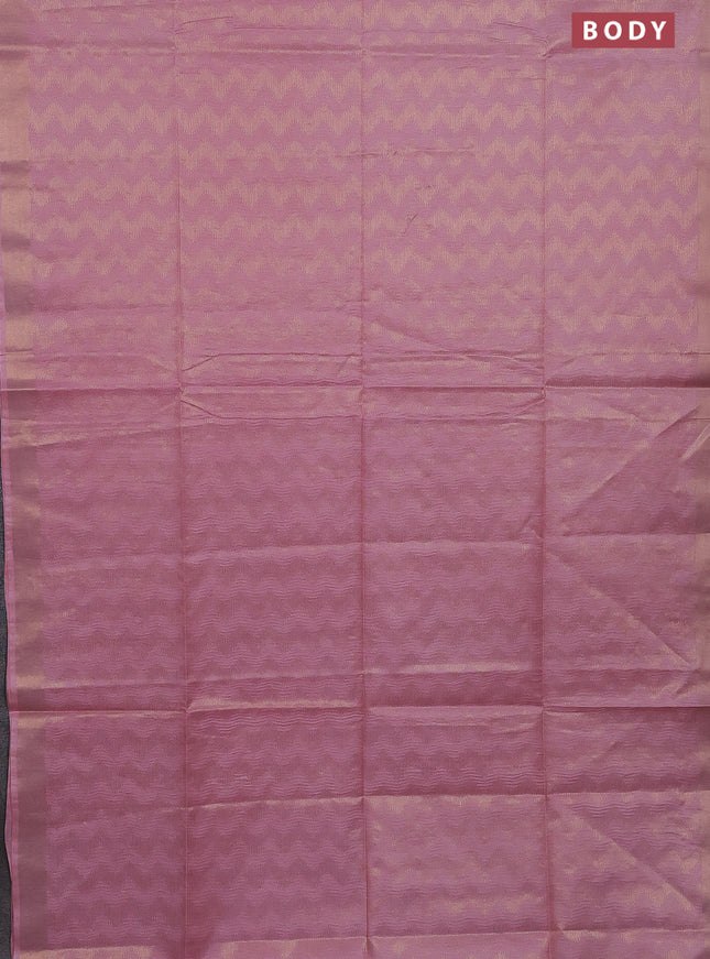 Semi munga jacquard saree peach shade with allover zari weaves and zari woven border