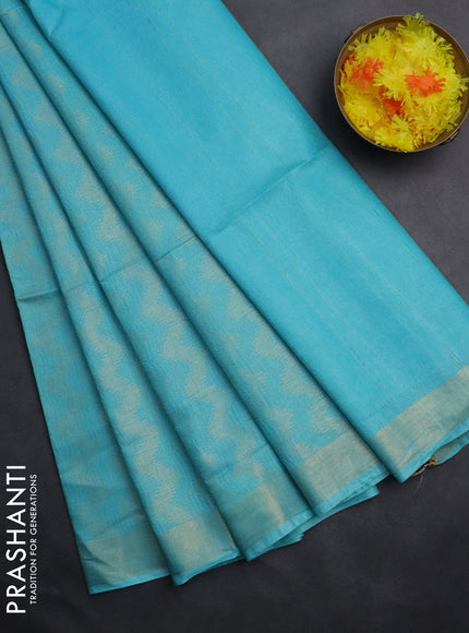 Semi munga jacquard saree light blue with allover zari weaves and zari woven border