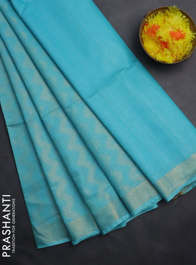 Semi munga jacquard saree light blue with allover zari weaves and zari woven border