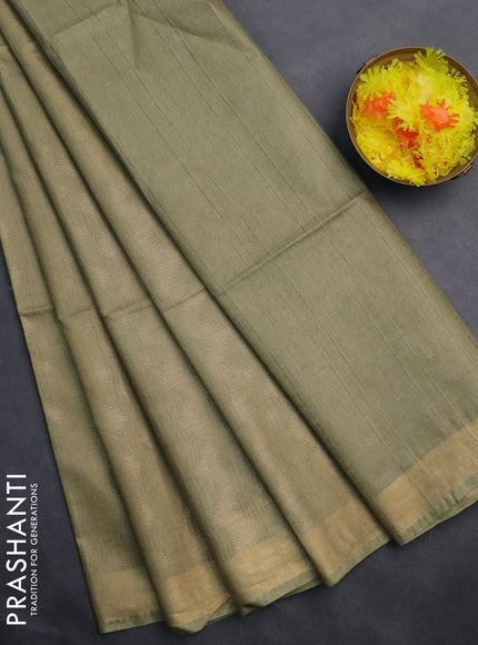 Semi munga jacquard saree pastel green with allover zari weaves and zari woven border