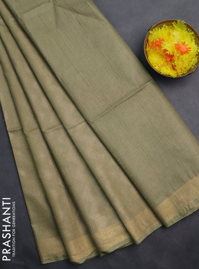 Semi munga jacquard saree pastel green with allover zari weaves and zari woven border