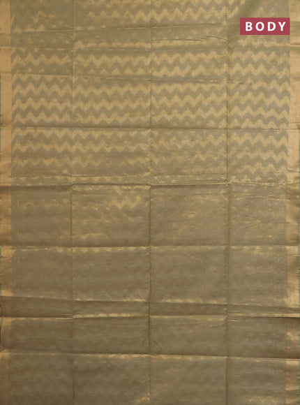 Semi munga jacquard saree pastel green with allover zari weaves and zari woven border