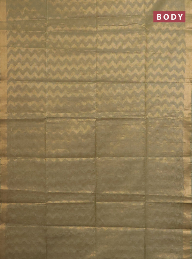 Semi munga jacquard saree pastel green with allover zari weaves and zari woven border