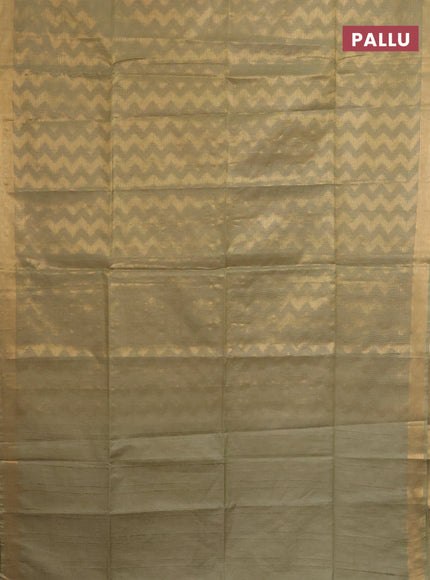 Semi munga jacquard saree pastel green with allover zari weaves and zari woven border