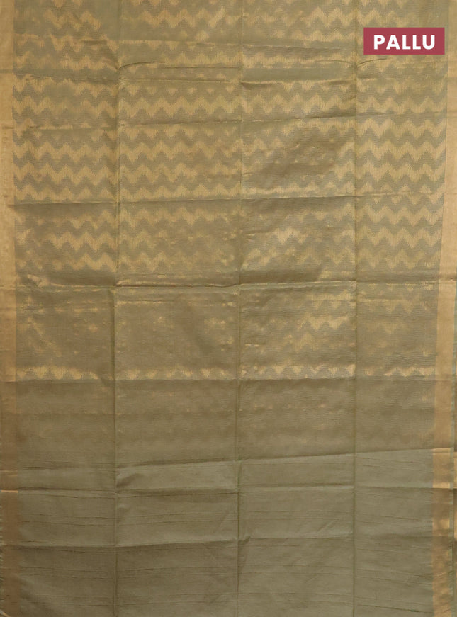 Semi munga jacquard saree pastel green with allover zari weaves and zari woven border