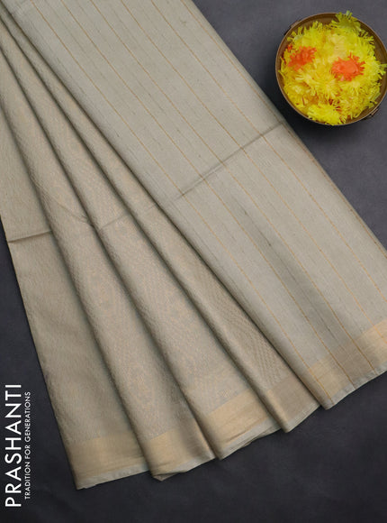 Semi munga jacquard saree pista green with allover zari weaves and zari woven border