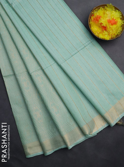 Semi munga jacquard saree pastel green with allover zari weaves and zari woven border