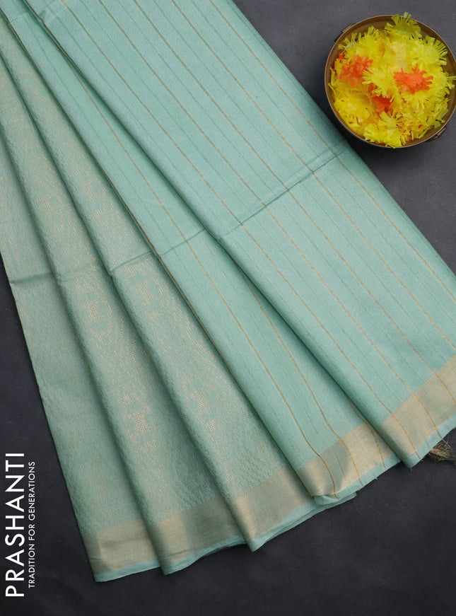 Semi munga jacquard saree pastel green with allover zari weaves and zari woven border