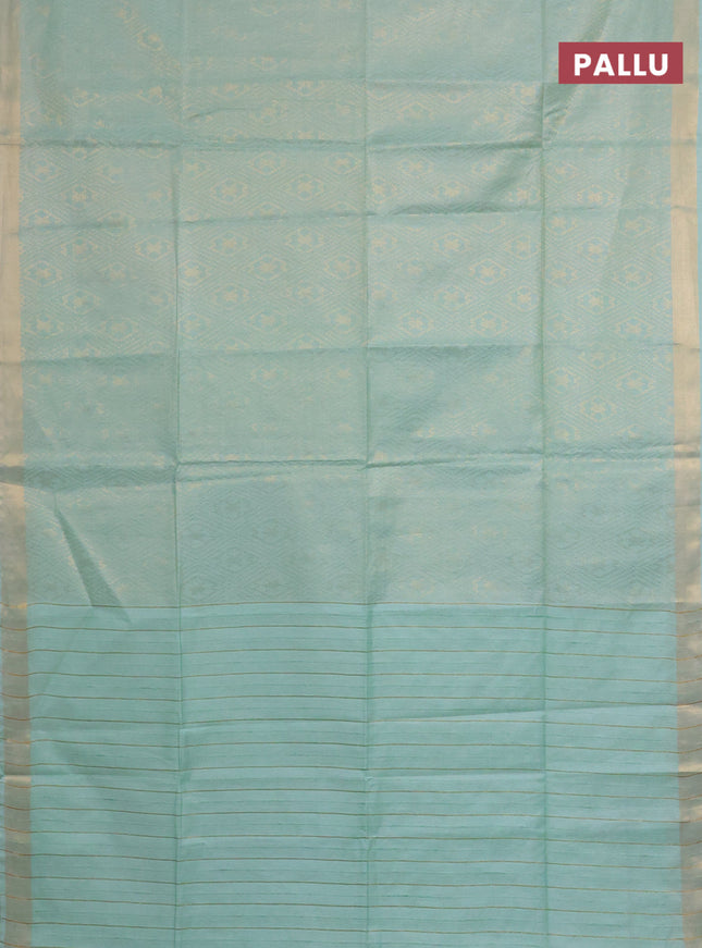 Semi munga jacquard saree pastel green with allover zari weaves and zari woven border