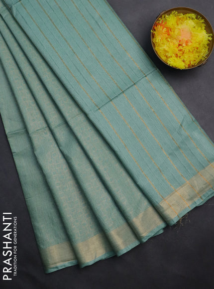 Semi munga jacquard saree pastel green with allover zari weaves and zari woven border