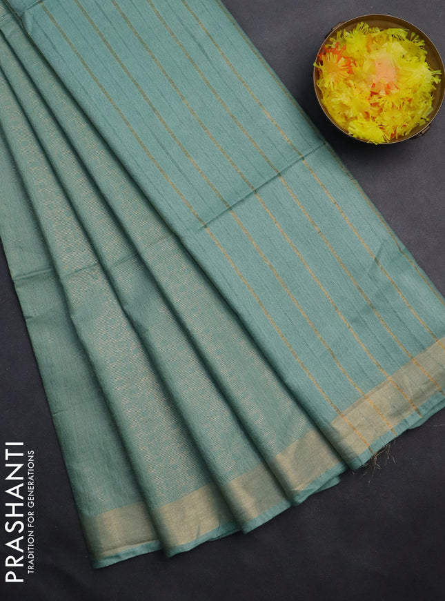 Semi munga jacquard saree pastel green with allover zari weaves and zari woven border