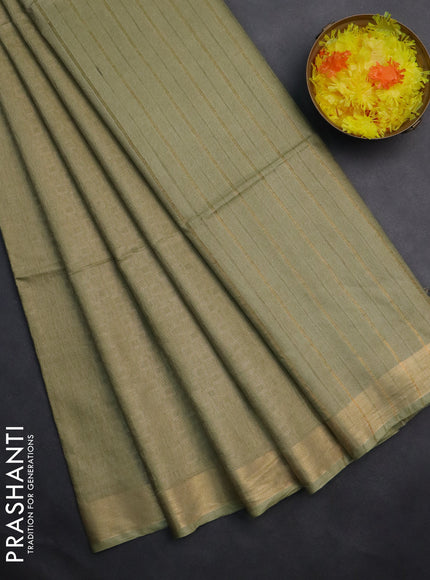 Semi munga jacquard saree pista green with allover zari weaves and zari woven border