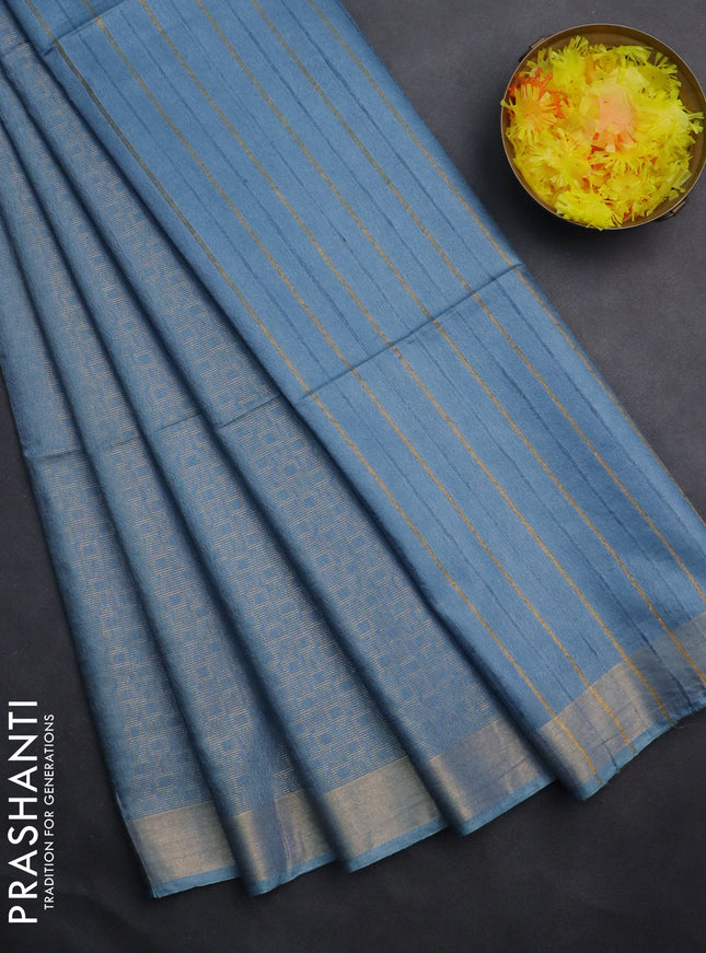 Semi munga jacquard saree pastel blue with allover zari weaves and zari woven border