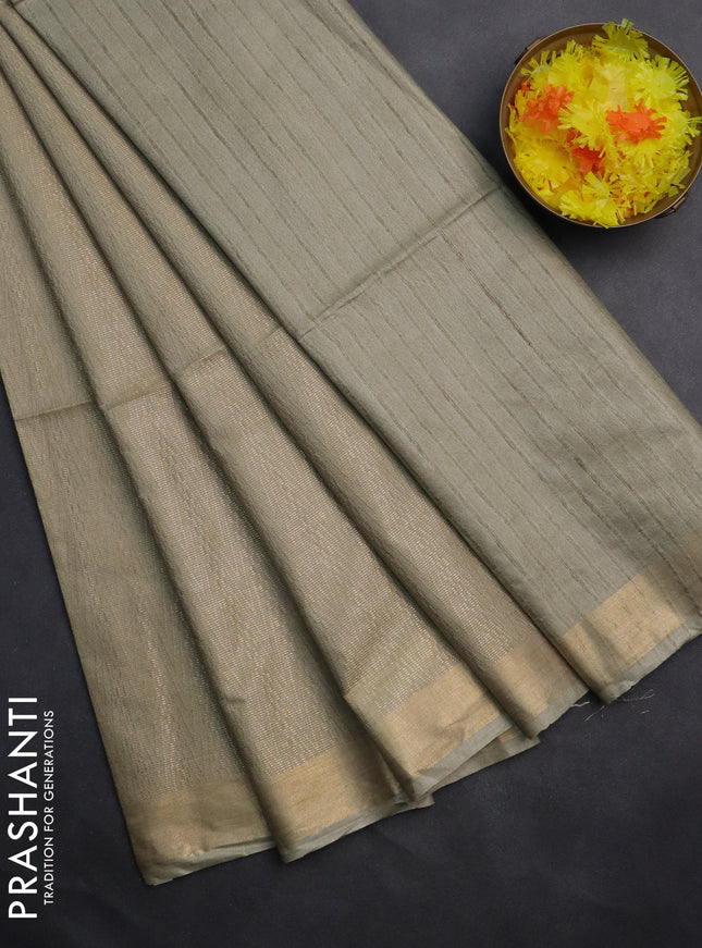 Semi munga jacquard saree pastel green with allover zari weaves and zari woven border