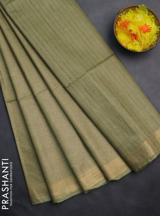 Semi munga jacquard saree pastel green with allover zari weaves and zari woven border