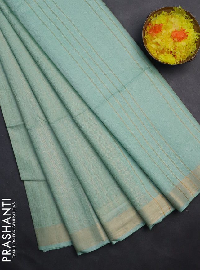 Semi munga jacquard saree pastel green with allover zari weaves and zari woven border