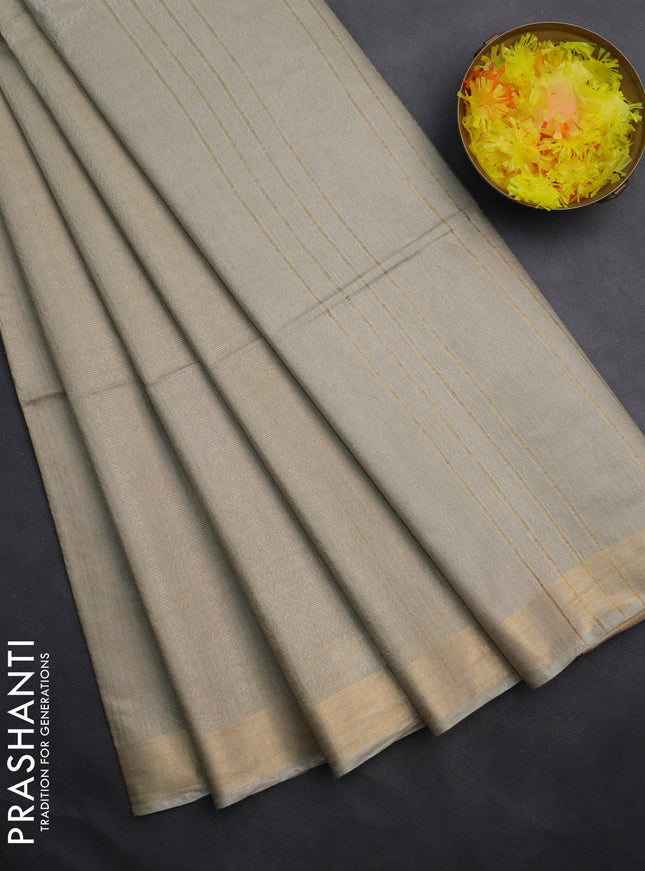 Semi munga jacquard saree pista green with allover zari weaves and zari woven border