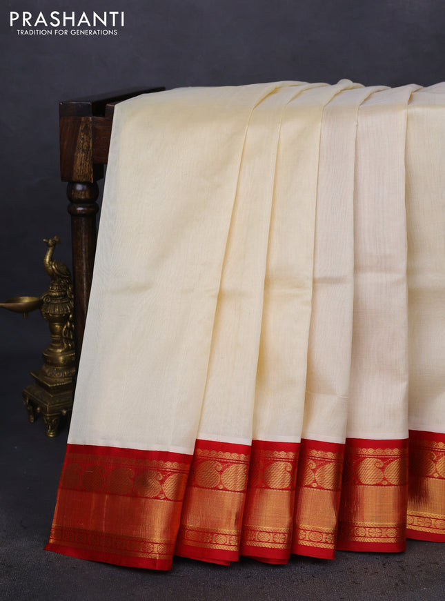 Kuppadam silk cotton saree cream and red with plain body and paisley zari woven border