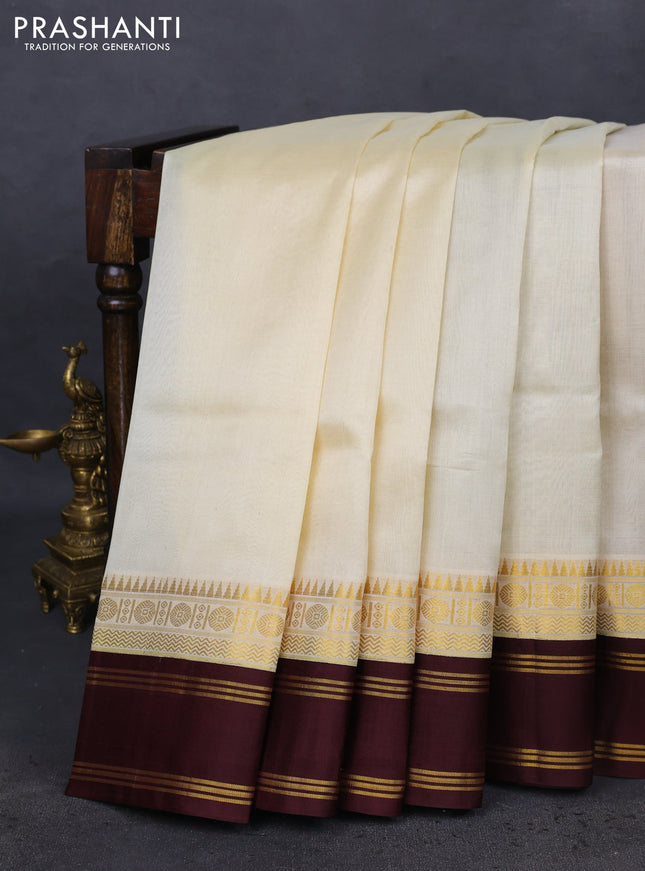 Kuppadam silk cotton saree cream and brown with plain body and rettapet zari woven border