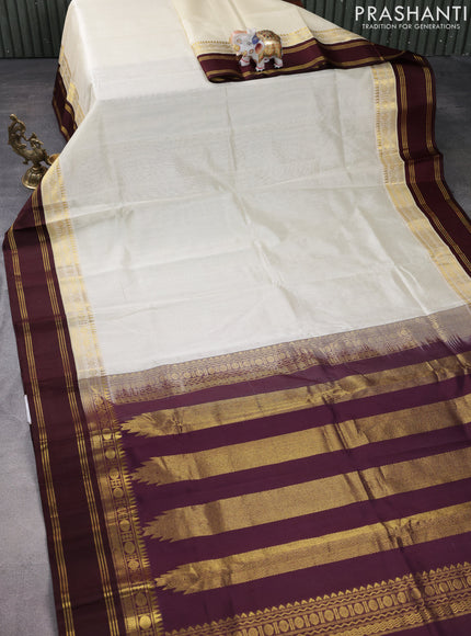 Kuppadam silk cotton saree cream and brown with plain body and rettapet zari woven border