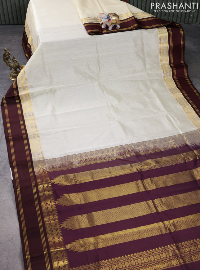 Kuppadam silk cotton saree cream and brown with plain body and rettapet zari woven border