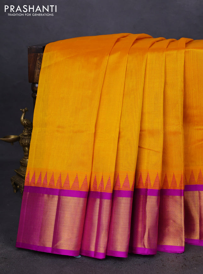 Kuppadam silk cotton saree mango yellow and purple with plain body and temple design zari woven border