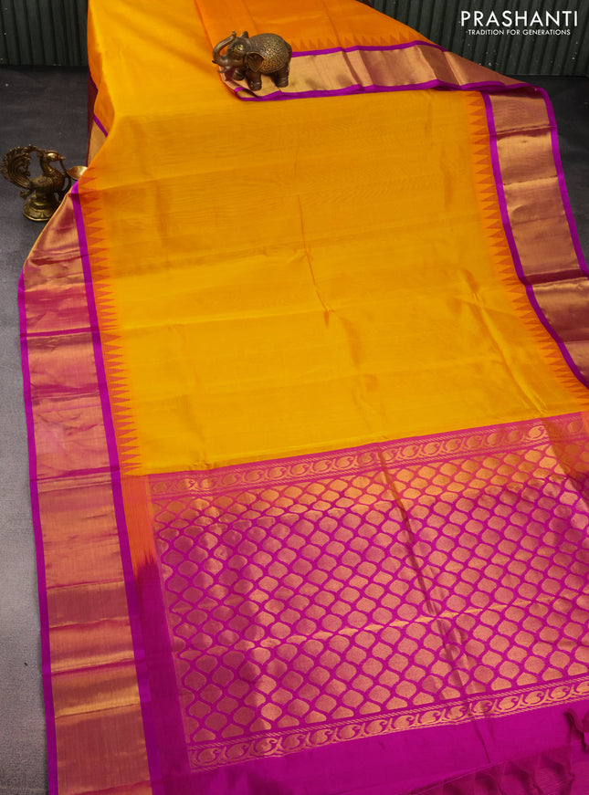 Kuppadam silk cotton saree mango yellow and purple with plain body and temple design zari woven border