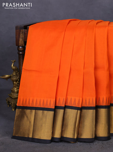 Kuppadam silk cotton saree orange and black with plain body and temple design zari woven border