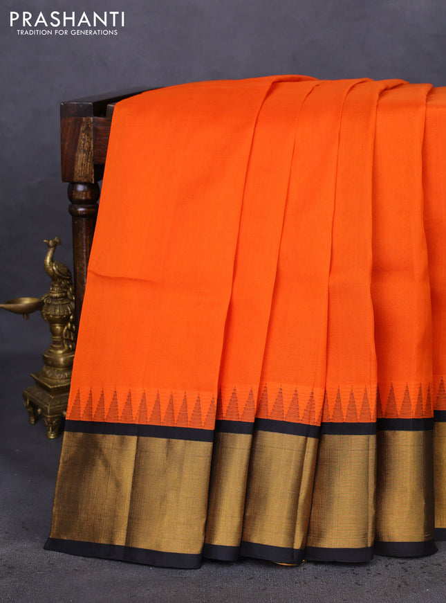 Kuppadam silk cotton saree orange and black with plain body and temple design zari woven border