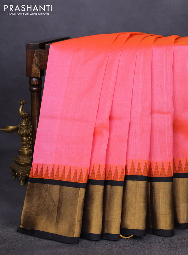 Kuppadam silk cotton saree peach pink and black with plain body and temple design zari woven border