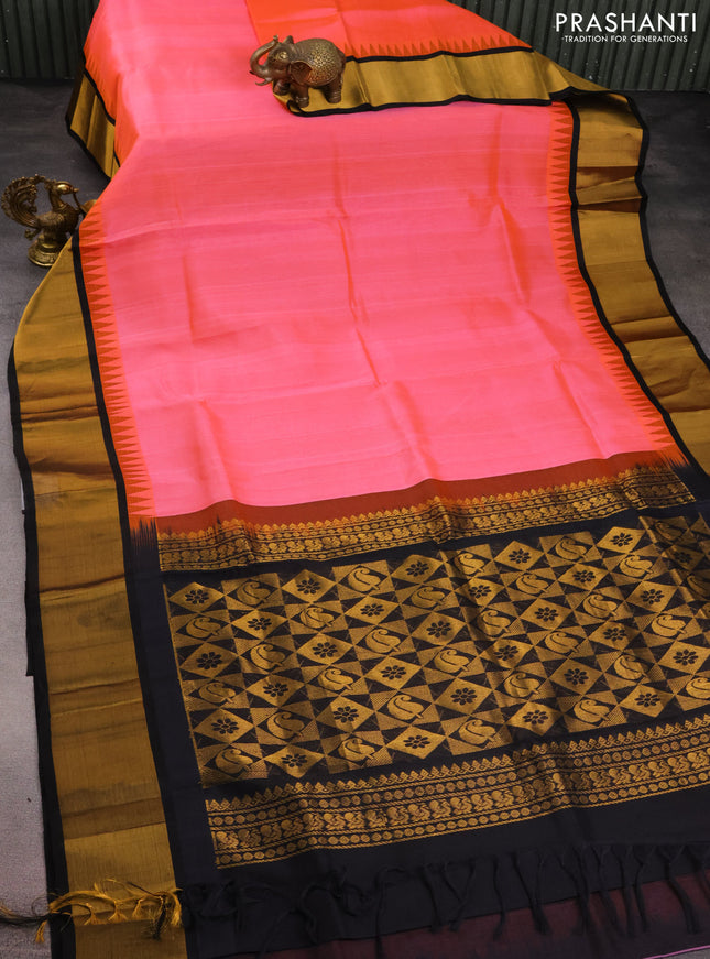 Kuppadam silk cotton saree peach pink and black with plain body and temple design zari woven border