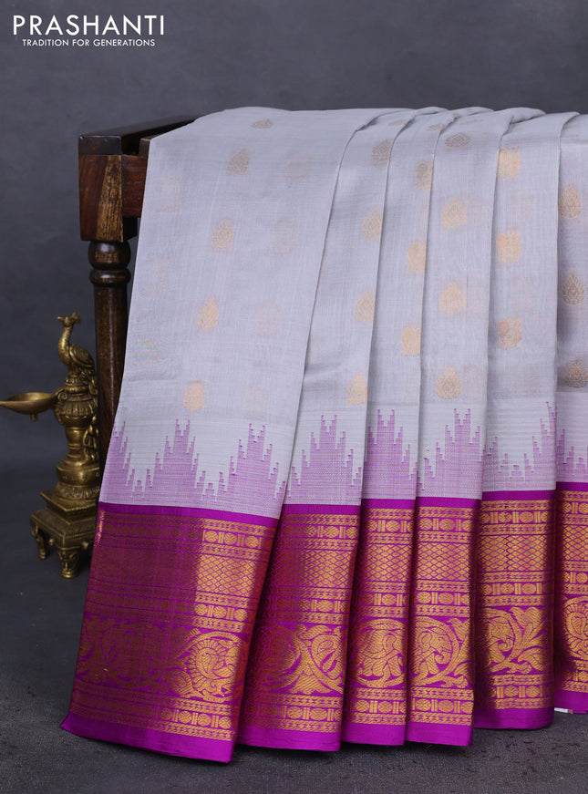 Kuppadam silk cotton saree pastel grey and purple with zari woven buttas and temple design zari woven border