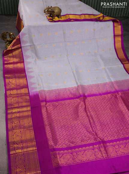 Kuppadam silk cotton saree pastel grey and purple with zari woven buttas and temple design zari woven border