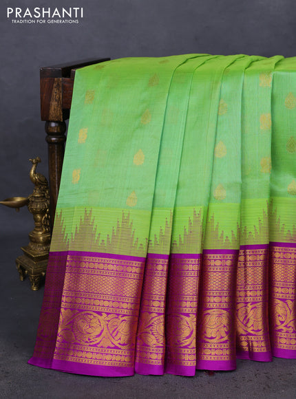 Kuppadam silk cotton saree light green and purple with zari woven buttas and temple design zari woven border