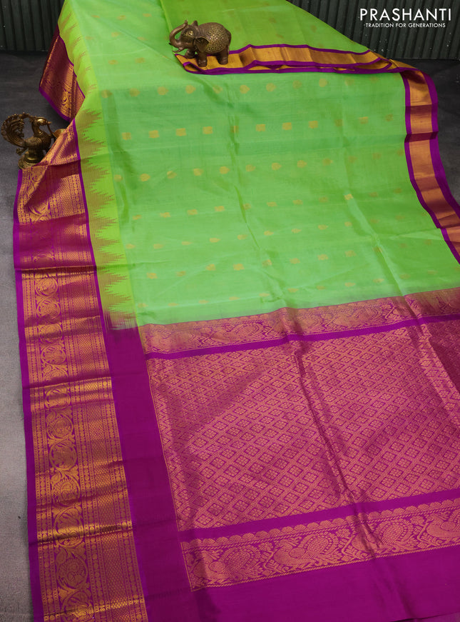 Kuppadam silk cotton saree light green and purple with zari woven buttas and temple design zari woven border