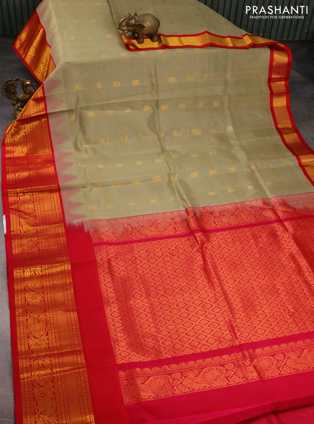 Kuppadam silk cotton saree beige and reddish pink with zari woven buttas and temple design zari woven border