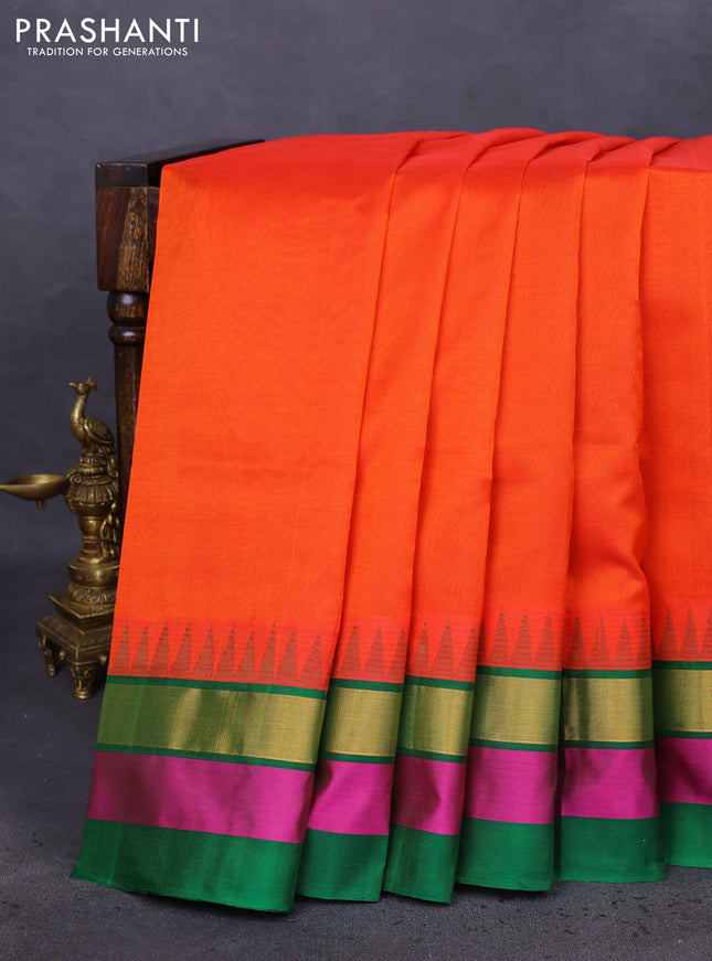 Kuppadam silk cotton saree orange and green with plain body and temple design zari woven simple border