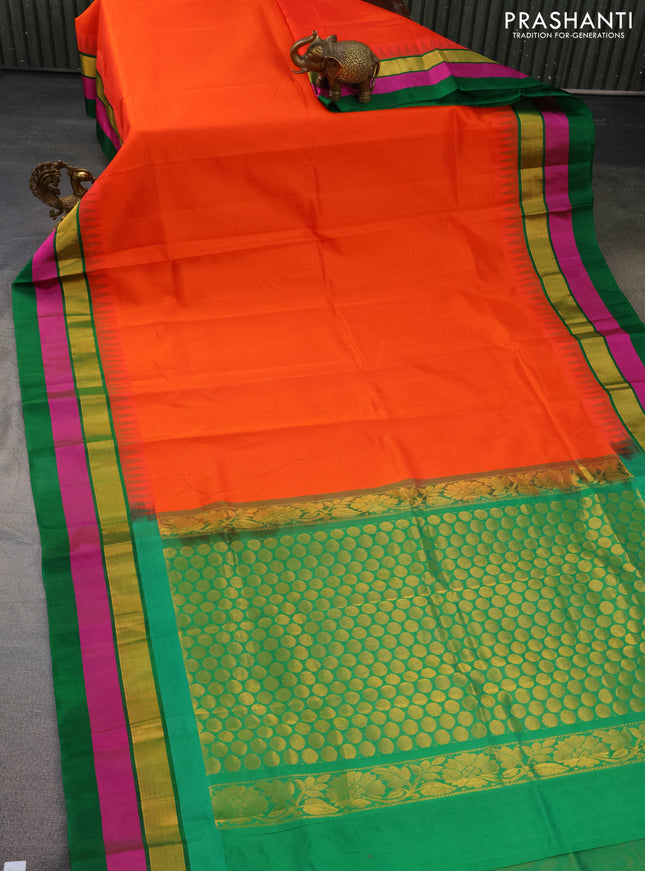 Kuppadam silk cotton saree orange and green with plain body and temple design zari woven simple border