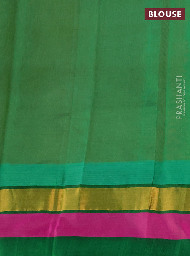 Kuppadam silk cotton saree orange and green with plain body and temple design zari woven simple border
