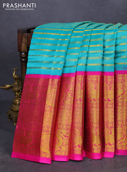 Kuppadam silk cotton saree teal blue and pink with allover zari stripes pattern and long zari woven border