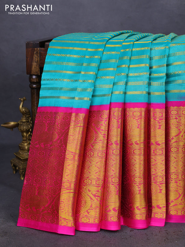 Kuppadam silk cotton saree teal blue and pink with allover zari stripes pattern and long zari woven border