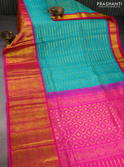 Kuppadam silk cotton saree teal blue and pink with allover zari stripes pattern and long zari woven border