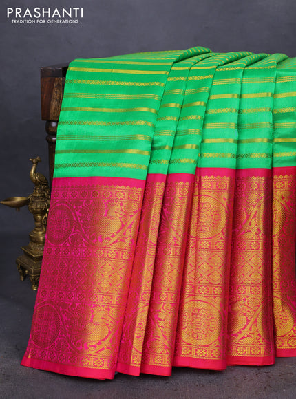 Kuppadam silk cotton saree green and pink with allover zari stripes pattern and long zari woven border