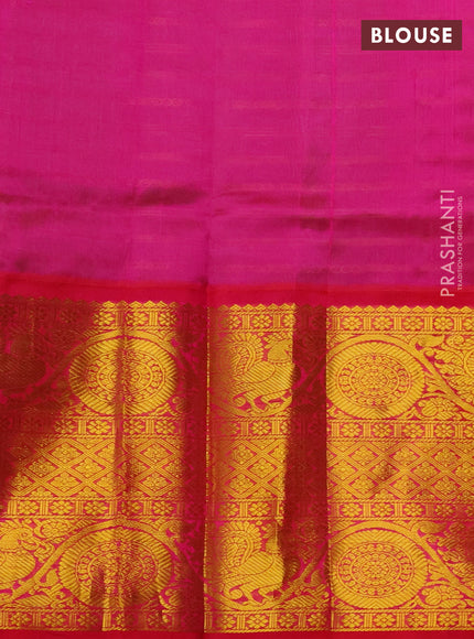 Kuppadam silk cotton saree green and pink with allover zari stripes pattern and long zari woven border