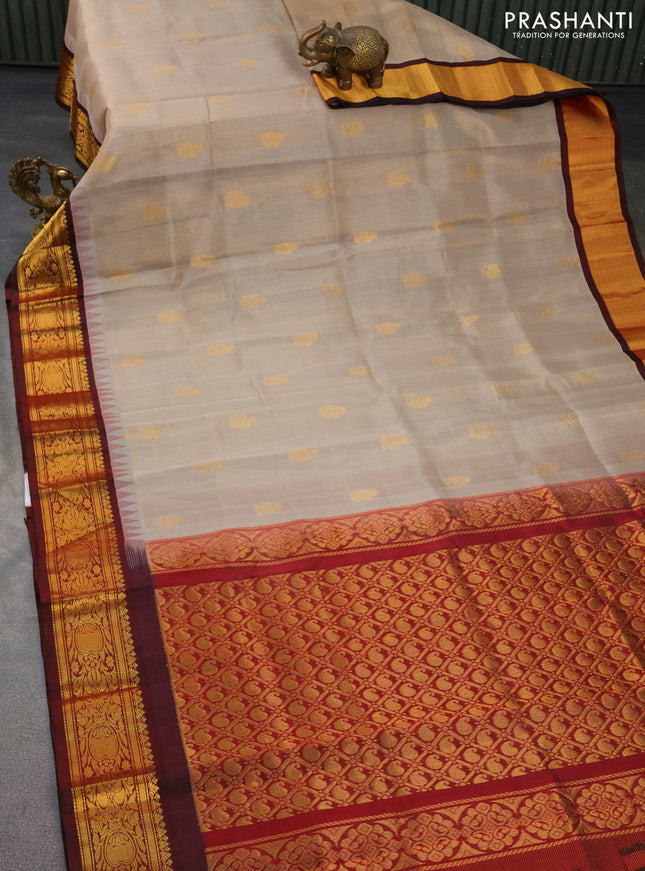Kuppadam silk cotton saree grey and maroon with allover vairosi pattern & buttas and temple design zari woven border