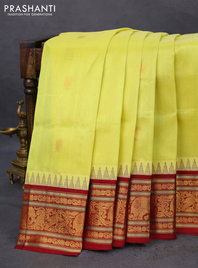 Kuppadam silk cotton saree yellow and maroon with allover vairosi pattern & buttas and temple design zari woven border