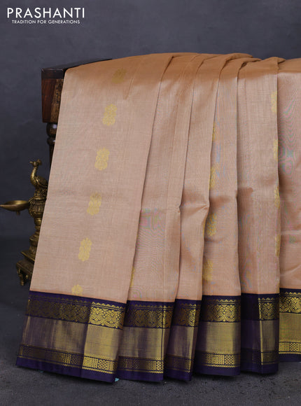 Kuppadam silk cotton saree sandal and dark blue with zari woven paisley buttas and zari woven border